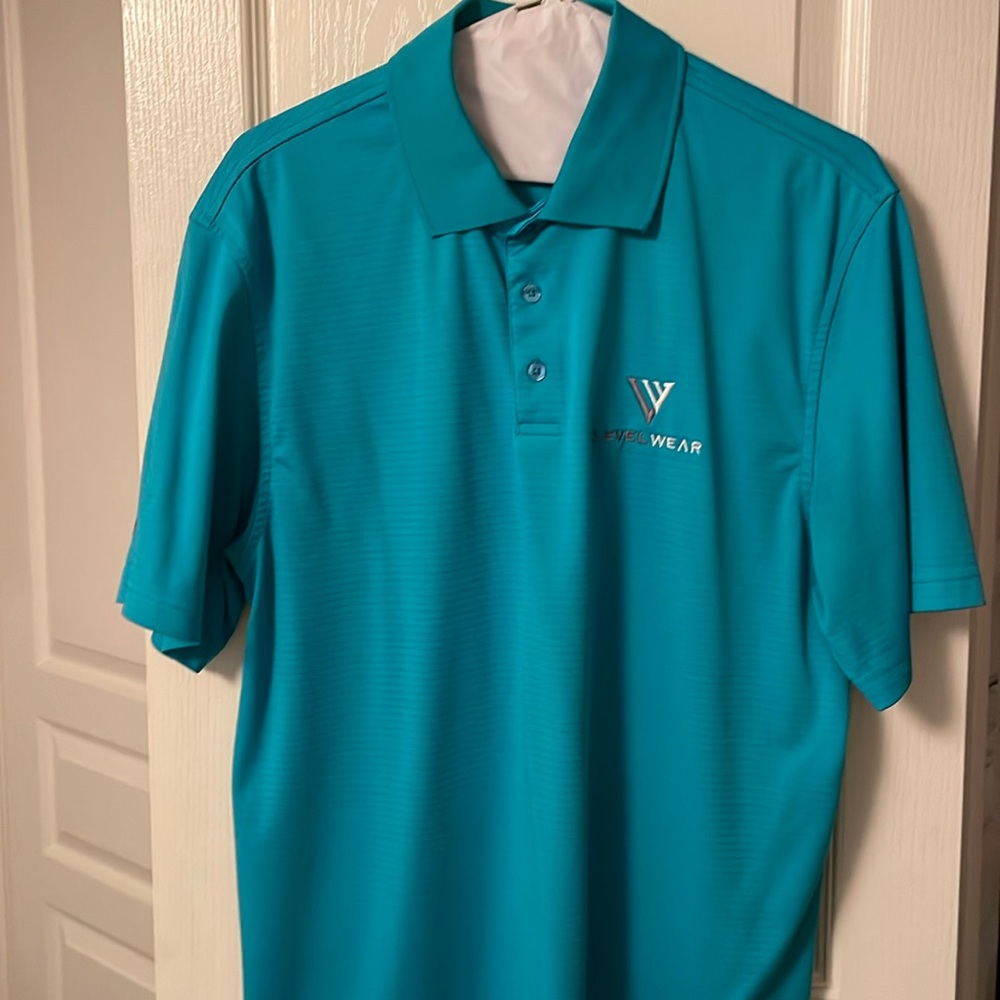 Levelwear men’s golf polo, in bright blue. Size medium